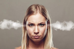 Blond Woman With Angry Face Steam Out of Ears