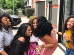 females sharing laughter and friendship